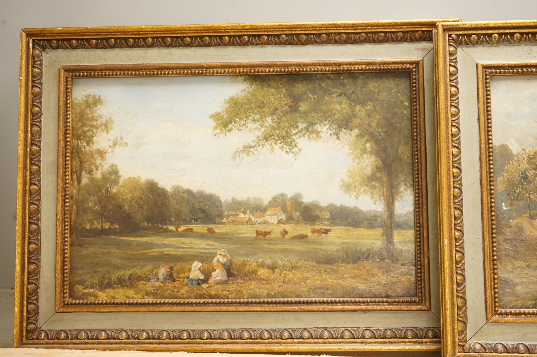 B. Holmes, Children in a meadow and riverscape, one signed, pair of oils on board, 19 x 29cm